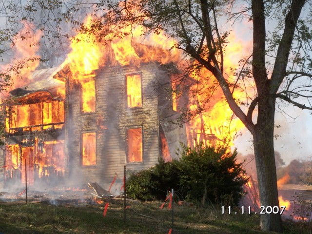 Once the firefighters let this fire go, it took less then an hour for the structure to burn to the ground.  Photo taken by K. Townsley